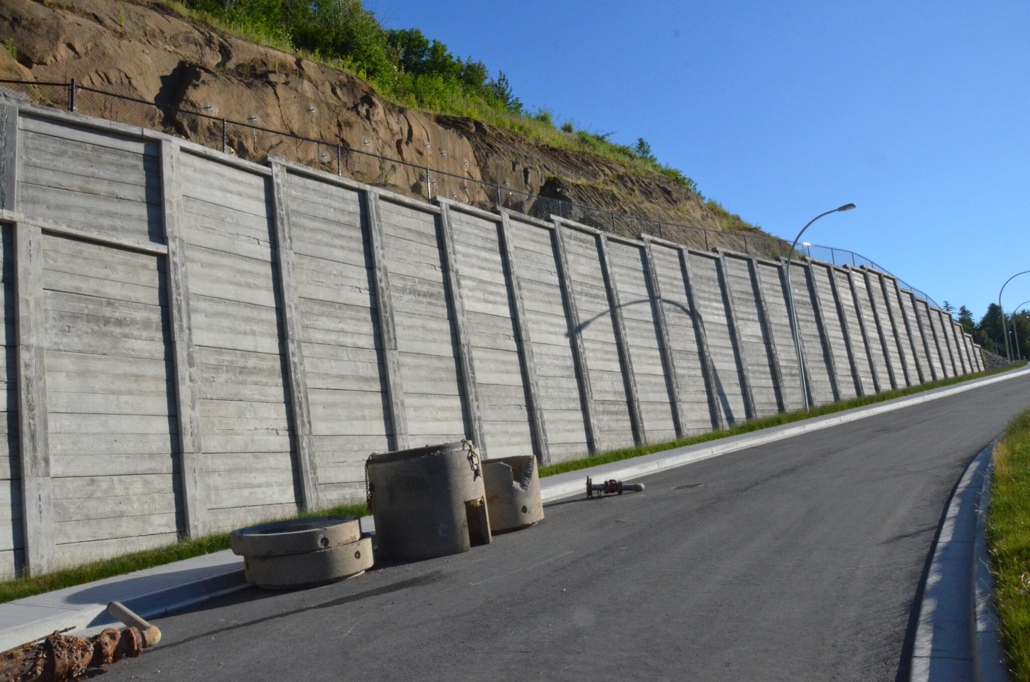 Slope Stabilization and Retaining Wall Construction To Make The Road Safe